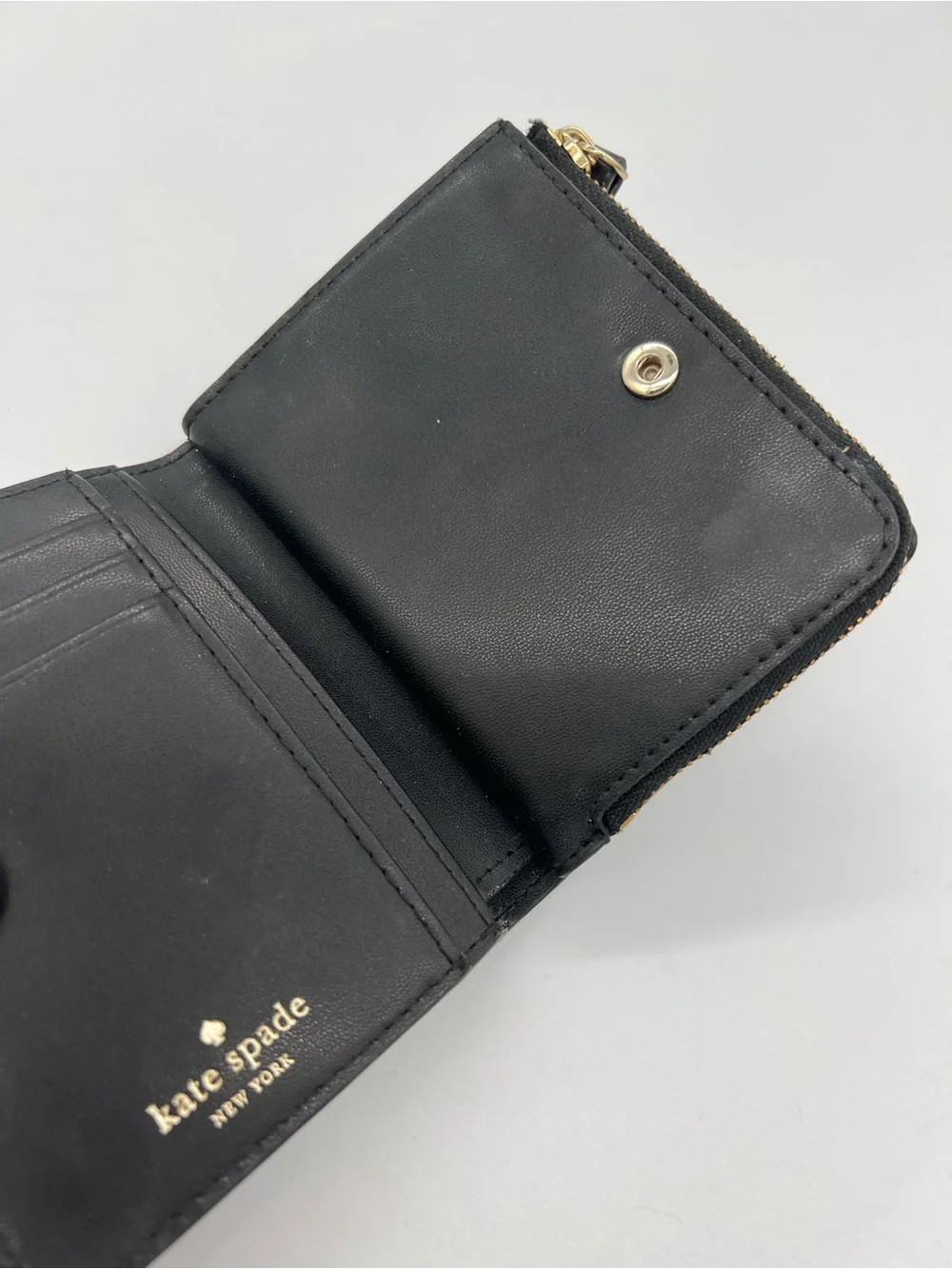 kate spade Black Pebbled Leather Zip Wallet with Gold Logo